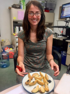 Natalie slices the sapodilla fruit to share with the Canopy staff.