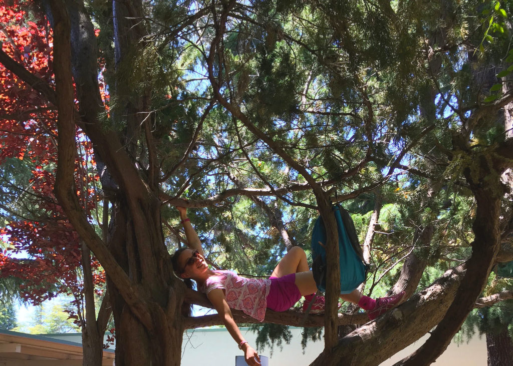 Student enjoying her time in a tree